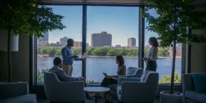 Group therapy at a Boston addiction treatment center overlooking the city.